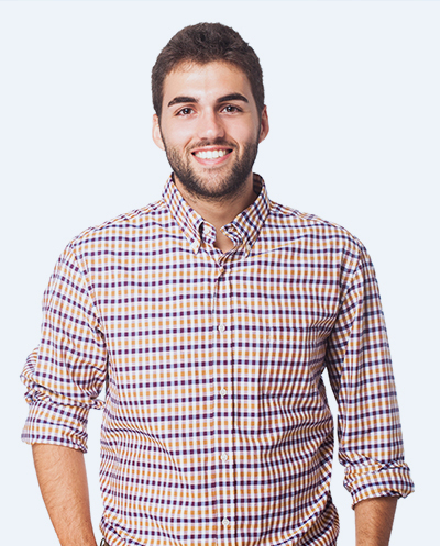 Portrait of beautiful young woman looking at camera over white background.